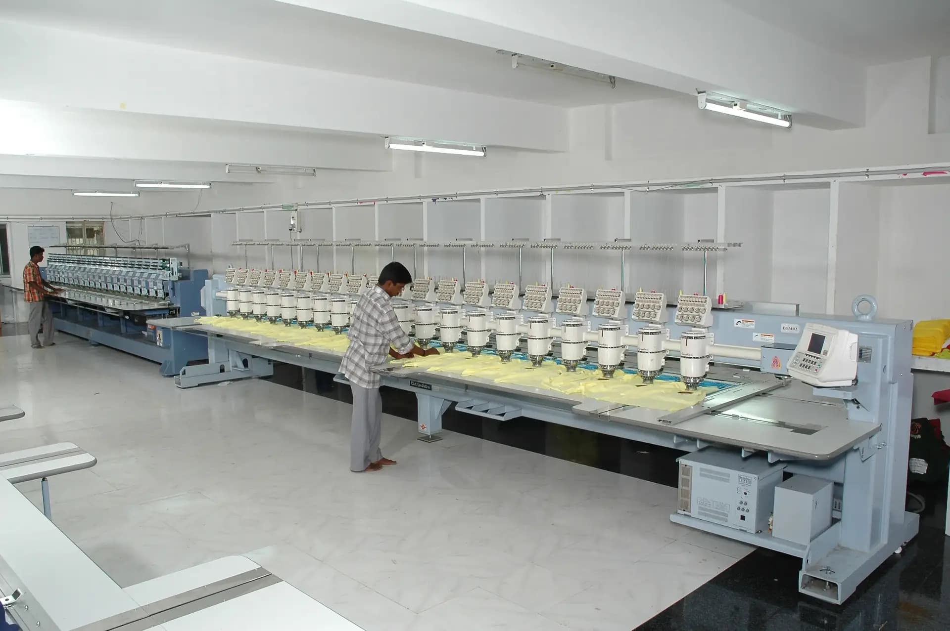 Multi-head embroidery line